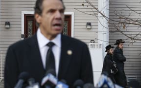 New York Governor Andrew Cuomo speaks to the media outside the home of rabbi Chaim Rottenbergin Monsey, in New York on December 29, 2019 after a machete attack that took place earlier outside the rabbi's home during the Jewish festival of Hanukkah in Monsey, New York.