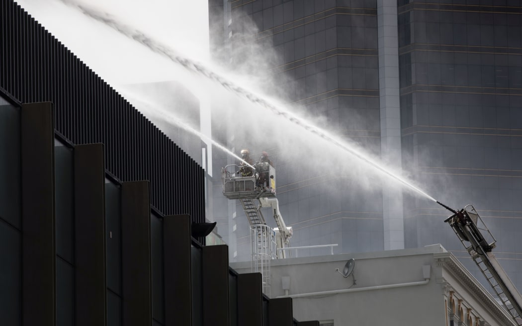 Fighting the fire on the second day.