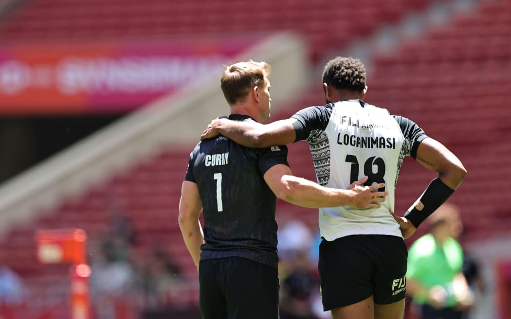 New Zealand’s Scott Curry and Fiji captain Ponepati Loganimasi after the game on day one of the HSBC SVNS Grand Final at Stadium Civitas Metropolitano on 31 May, 2024 in Madrid, Spain.