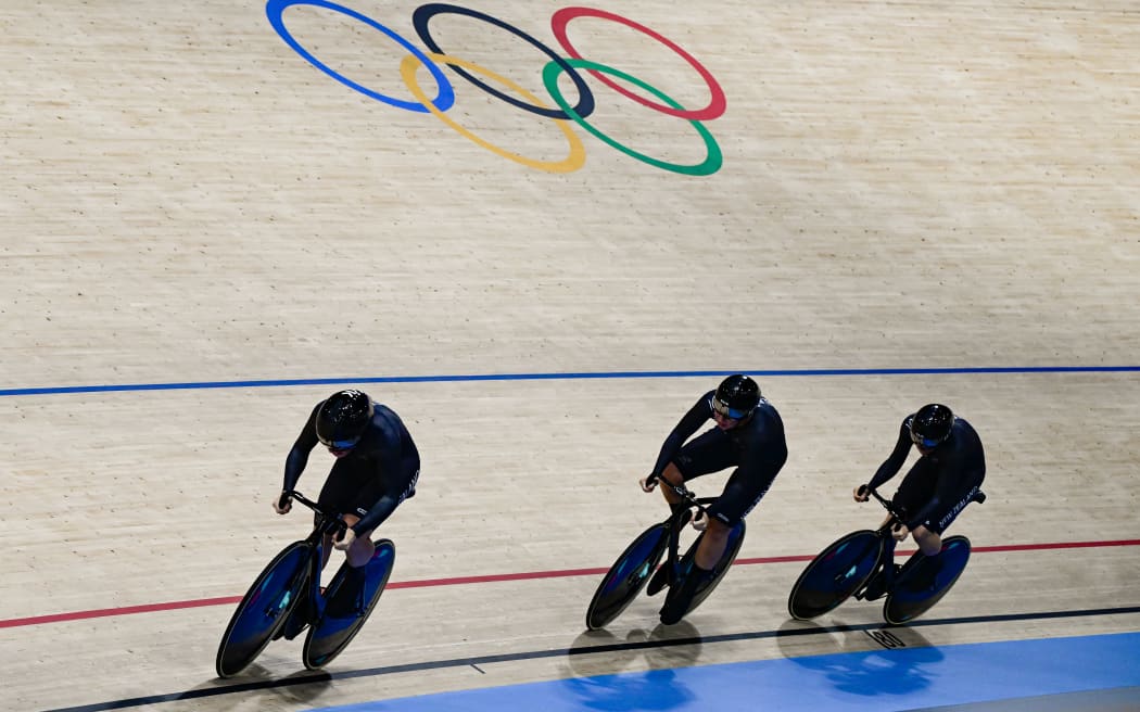 New Zealand's Rebecca Petch, New Zealand's Shaane Fulton, and New Zealand's Ellesse Andrews compete in the women's track cycling team sprint first round of the Paris 2024 Olympic Games at the Saint-Quentin-en-Yvelines National Velodrome in Montigny-le-Bretonneux, south-west of Paris, on August 5, 2024. (Photo by John MACDOUGALL / AFP)