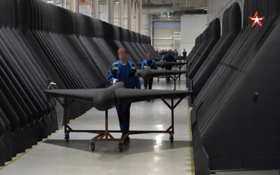 Footage on Russian state TV from the military channel Zvezda shows deadly attack drones being assembled in what it calls the biggest drone factory in the world.