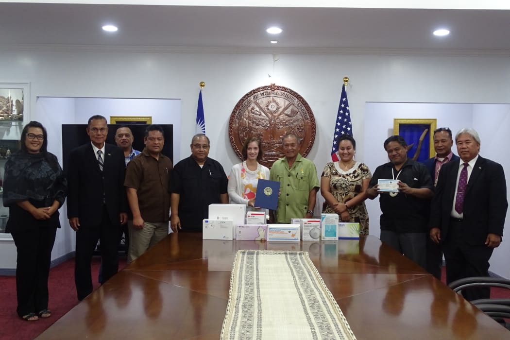 US Ambassador to the Marshall Islands Roxanne Cabral, (centre), met President David Kabua and his Cabinet to officially present Covid-19 related aid