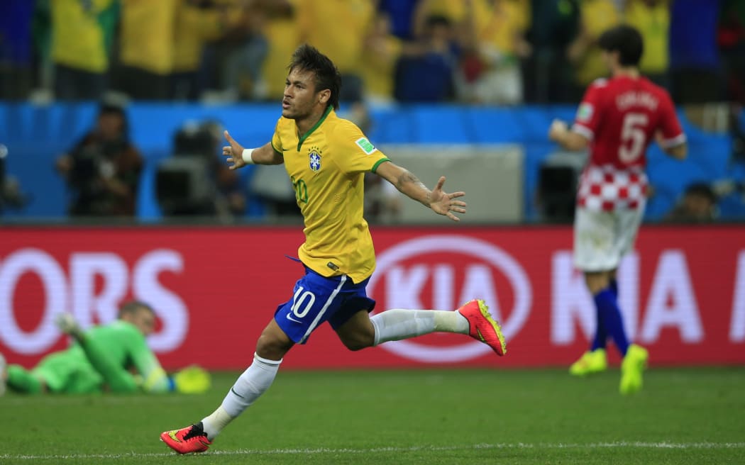 Brazil's forward Neymar celebrates his goal.