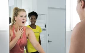Amy Schumer and Sasheer Zamata in I Feel Pretty.