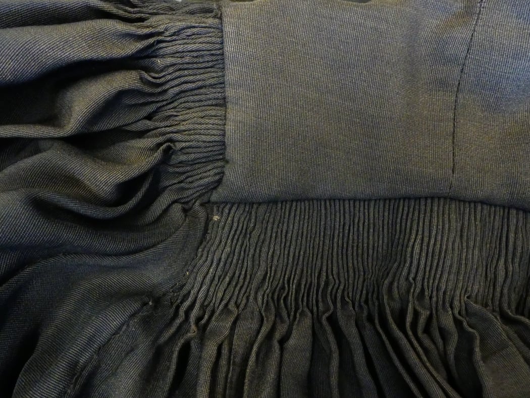Detail of a gown worn by Marion Steven – one of the many artefacts from University of Canterbury’s past.