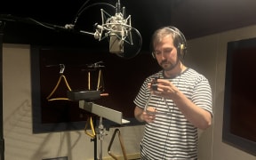 NZSO percussionist Sam Rich in the studio at RNZ in Wellington