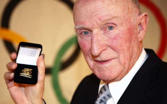 Sir Murray Halberg. Auckland Central Olympic Function to celebrate 100 years of New Zealand participation in the Olympic Games in 2009. All former Olympic athletes recieved a badge of recognition from the NZ Olympic Commitee.