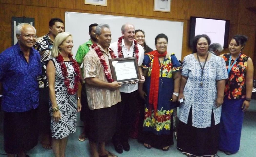 The US Ambassador Mark Gilbert with staff at Samoa's National University