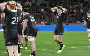 Beauden Barrett dejected as the All Blacks crash to a record loss.