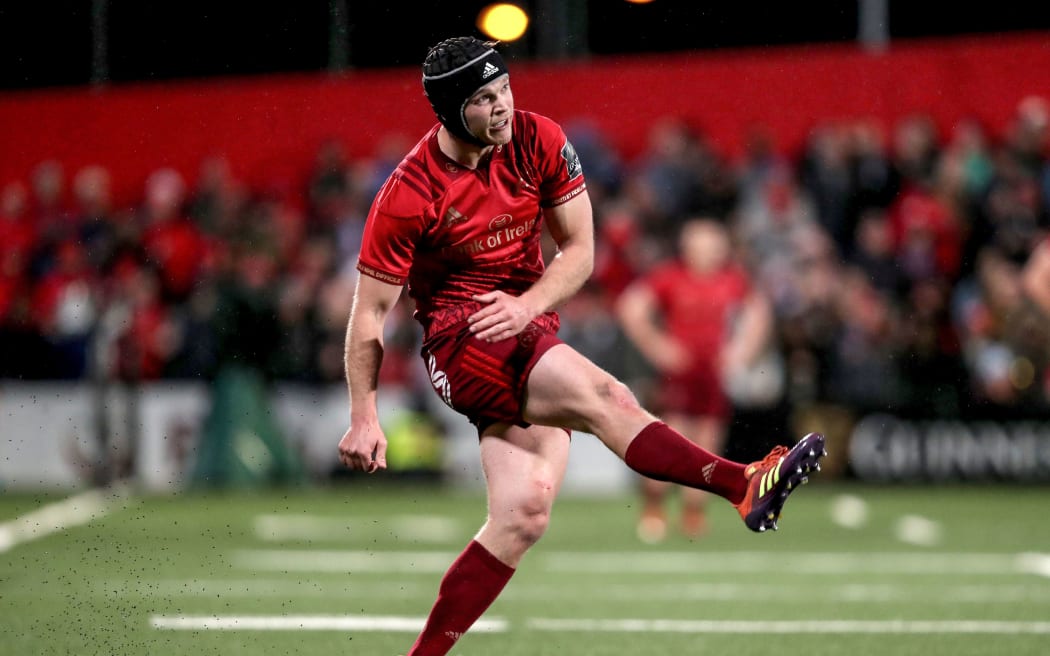 Munster's Tyler Bleyendaal kicks a conversion.