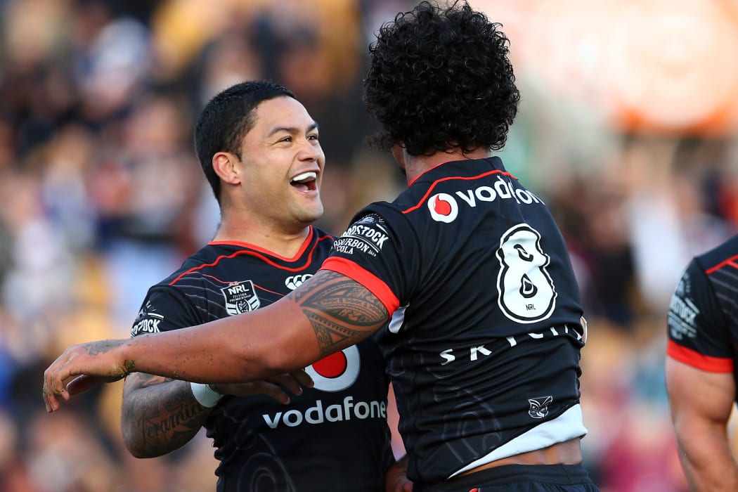 Warriors James Gavet and Issac Luke celebrate in their winning game against the Sydney Roosters at Mt Smart Stadium.