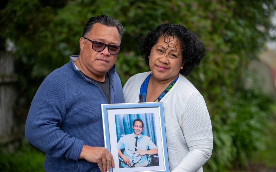 Rev Dr Matagi Vilitama and Joanna Matagi hold a photo of their 25-year-old son Tofi Matagi, who died after an assault at a Mt Roskill bar on 31 August.