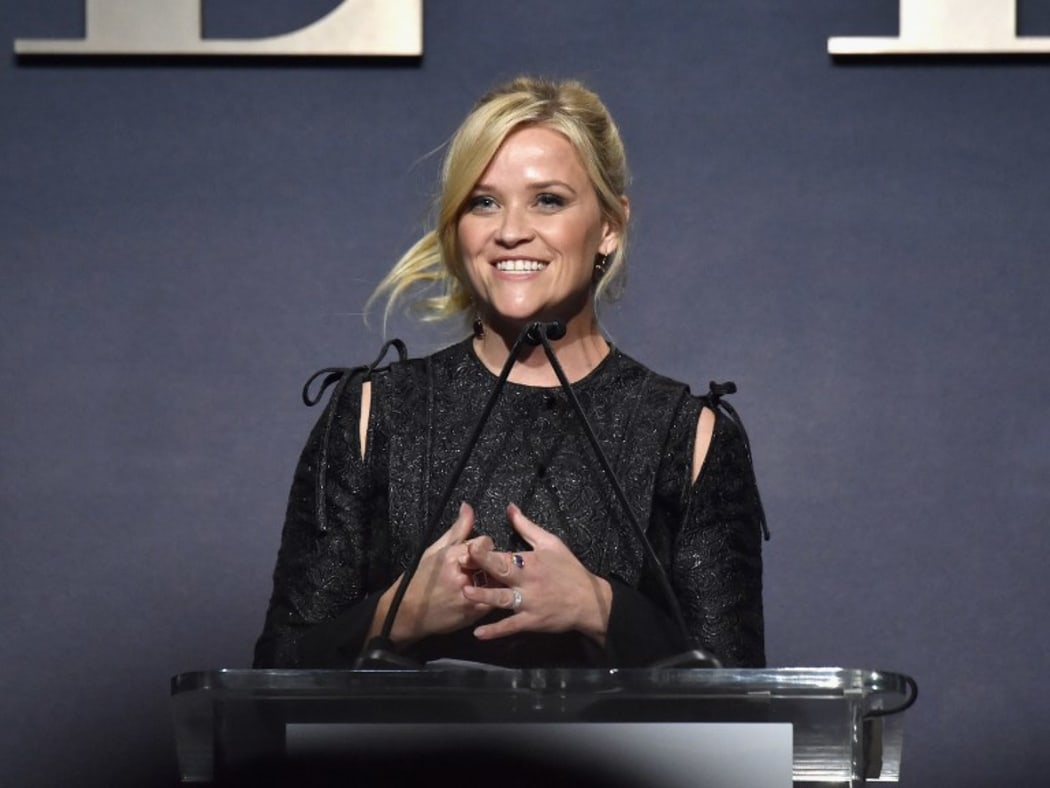 Reese Witherspoon speaks on stage during ELLE's 24th Annual Women in Hollywood Celebration.