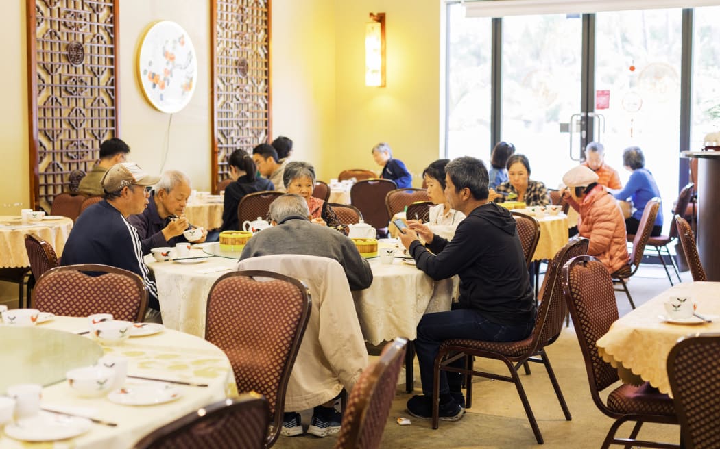 Diners at a yum cha restaurant