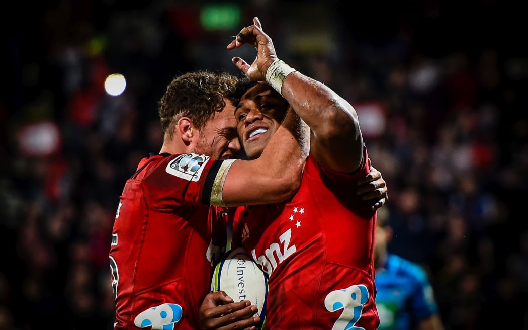 Israel Dagg of the Crusaders celebrates with Seta Tamanivalu.