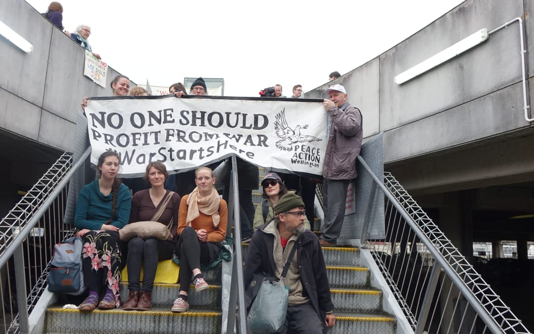 Protesters says they are standing against the promotion of war.