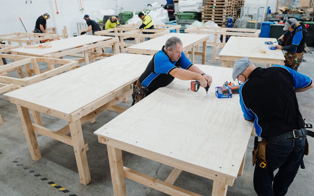 Master builders restore Abilities Group workstations destroyed by fire.