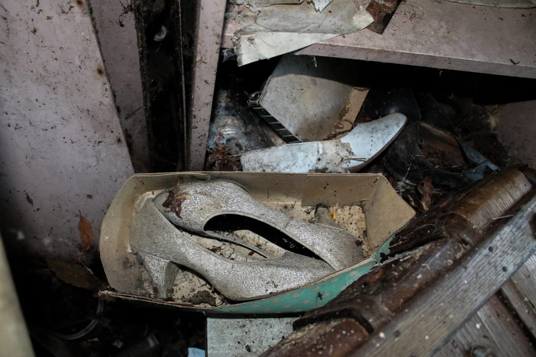 A pair of high heels found in an abandoned home in Karaka.