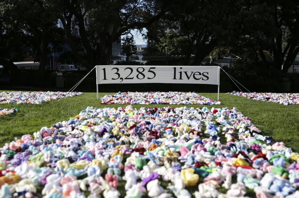 Some of the more than 13,000 booties specially knitted for the display.