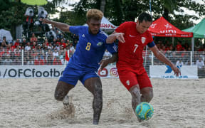 Solomon Islands' Anthony Talo and Tahiti's Raimana Li Fung Kuee battle for possession in the final.