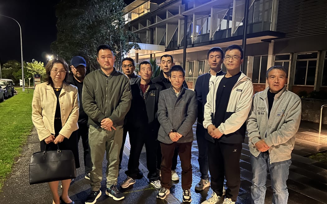 Employment law advocate May Moncur (left) and a group of exploited Chinese migrant workers after the meeting with immigration minister Andrew Little.