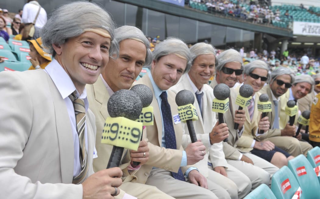 Spectators dressed Richie Benaud watching the New Year's Test between Australia and Pakistan in Sydney in 2010.