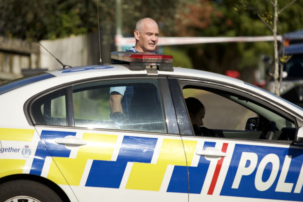 Police at the scene of a shooting in Massey, Auckland.