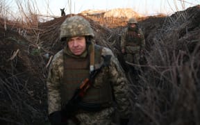 Ukrainian soldiers on the front line with Russia backed separatists, near Novognativka village, Donetsk region on 21 February 2022.