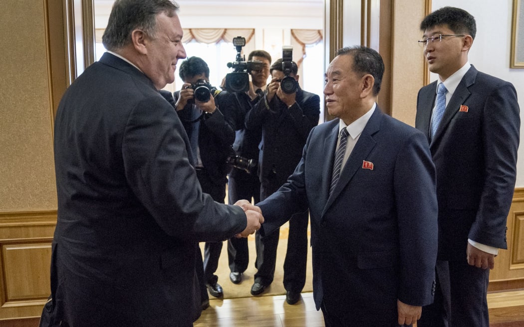 US Secretary of State Mike Pompeo shakes hands with Kim Yong Chol, a North Korean senior ruling party official and former intelligence chief, for a second day of talks at the Park Hwa Guest House in Pyongyang on July 7, 2018.