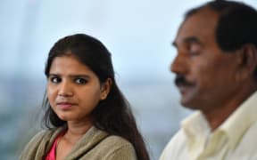 Ashiq Mesih (R) and Eisham Ashiq, the husband and daughter of Asia Bibi, speak during an interview with AFP in London on October 12, 2018.