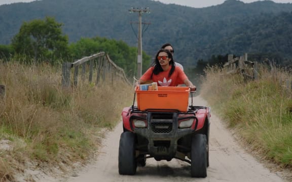 Uenuku rides quadbike through Coromandel
