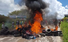 Residents of the Brazilian border town of Pacaraima burn tyres and belongings of Venezuelans immigrants after attacking their two main makeshift camps, leading them to cross the border back into their home country.