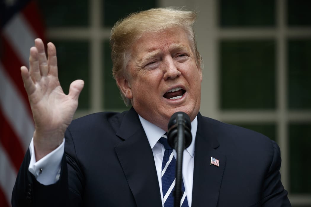 President Donald Trump delivers a statement in the Rose Garden after cutting short a meeting with senior Democrats.