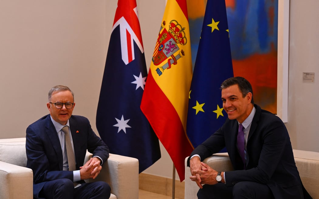 Spain's Prime Minister Pedro Sanchez (R) and Australia's Prime Minister Anthony Albanese take part in a meeting ahead of a NATO summit, at La Moncloa Palace in Madrid, on June 28, 2022. (Photo by GABRIEL BOUYS / AFP)