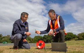 Council natural hazards manager Dr Jean-Luc Payan (left) and GNS Science principal scientist Dr Simon Cox monitor the groundwater behaviour.