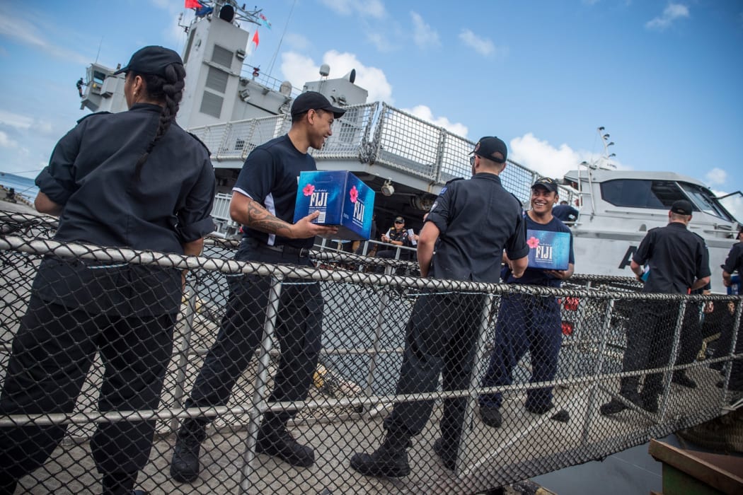 HMNZS Wellington being loaded with aid in Fiji post Cylone Winston