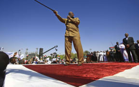 Sudan's President Omar al-Bashir speaks during a rally with his supporters in the Green Square in the capital Khartoum on 9 January, 2019.