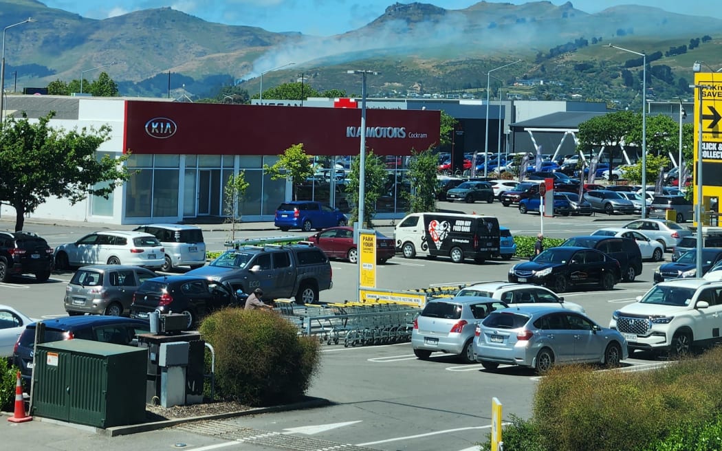 Smoke from a fire in the Port Hills is visible from RNZ's central city office in Christchurch.