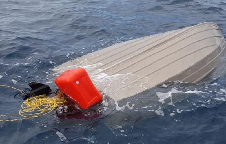 The boat was found capsized off Port Waikato.