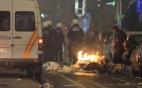 Crowds clashed with police in Brussels following Morocco's football win.