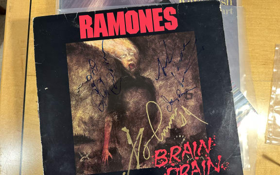 A signed copy of Brain Drain, a 1989 album by the New York punk act Ramones.