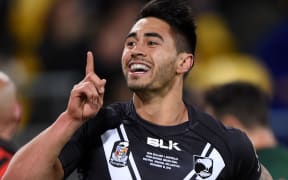 Kiwis playmaker Shaun Johnson celebrates after a try in the Four Nations.