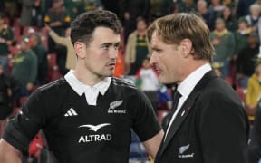 Will Jordan  of the All Blacks, left and Scott Robertson head coach.