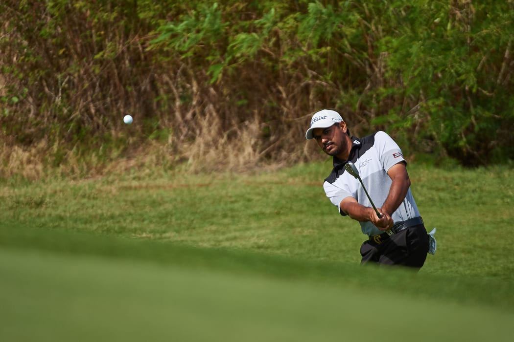 Gaganjeet Bhullar chips during his final round.
