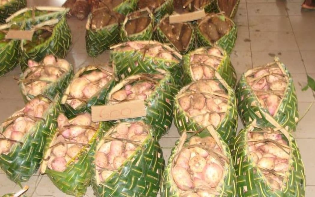 Root crop in traditional woven baskets in Vanuatu
