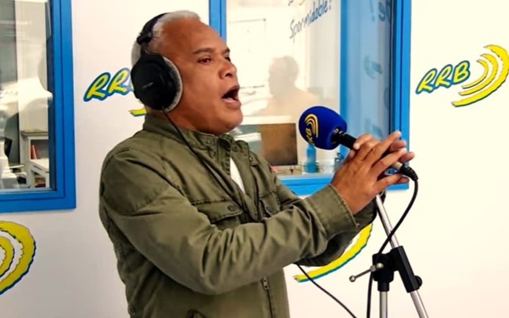 Willy Gatuhau, spokesman for New Caledonia’s federation of Citizens Resistance Committee, sings French national anthem La Marseillaise during a live broadcast to mark 24 September 1853, day of France officially taking possession of the South Pacific archipelago – PHOTO screen shot RRB