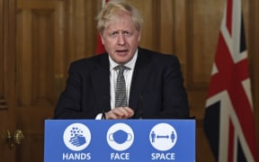 Britain's Prime Minister Boris Johnson speaks during a virtual press conference inside 10 Downing Street in central London on October 31, 2020 to announce new lockdown restrictions in an effort to curb rising infections of the novel coronavirus.