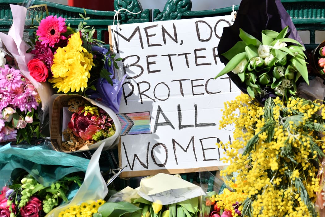 Flowers and messages at the site of a planned vigil for Sarah Everard on Clapham Common.