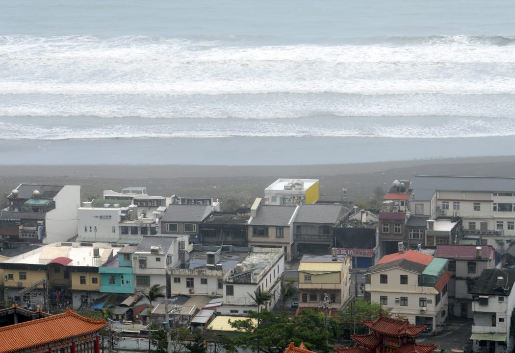 Waves hit the shore line near the Wushih harbour in Yilan as typhoon Goni approaches eastern Taiwan last year.