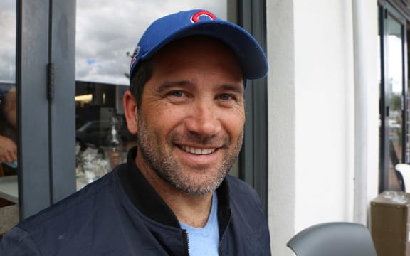 Man in blue cap